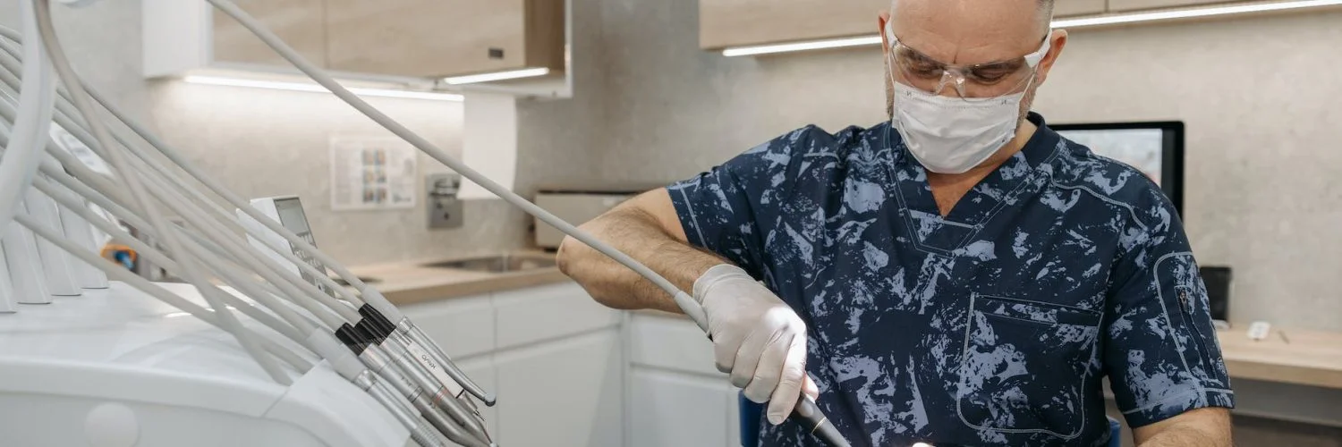dentist checking on a patient s teeth