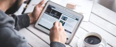 man using stylus pen for touching the digital tablet screen
