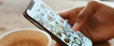 selective focus photography of person using iphone x