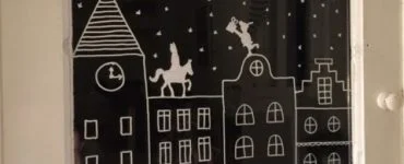 leuke raamversiering met huisjes sinterklaar